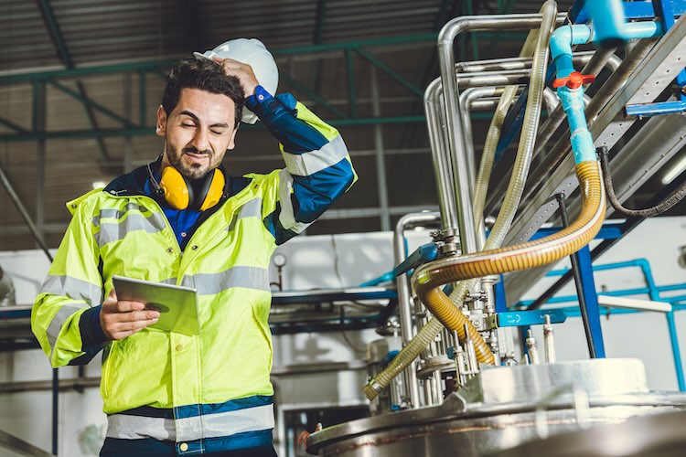Stressed construction worker wondering what does public liability cover